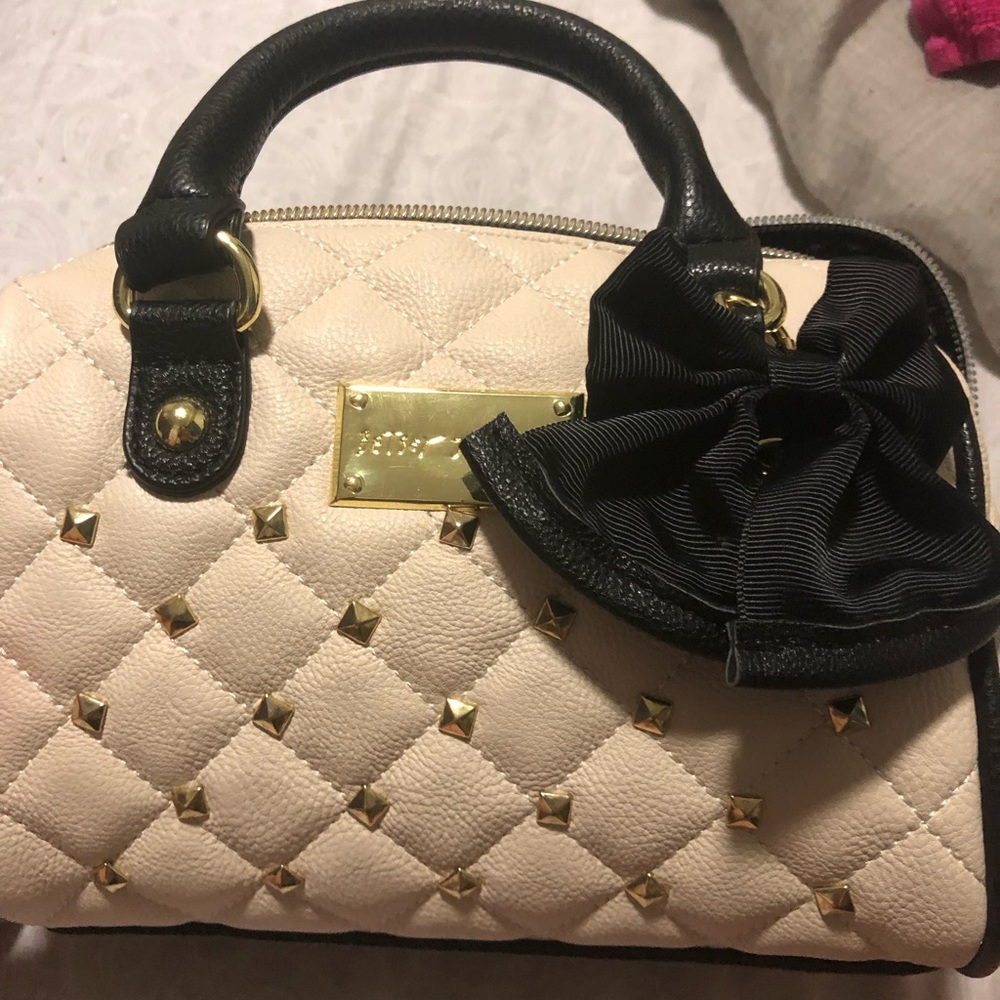 Pale pink faux leather purse